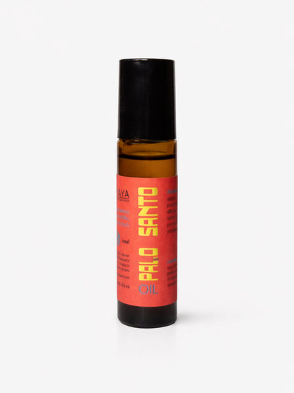 Bottle of Santo Peru oil with a red label on a white background