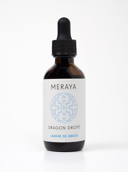 A bottle of 'CELLULAR RENEWAL - 100% Sangre de Grado' by Meraya with a dropper, against a white background.