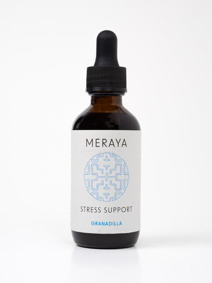 A bottle of Meraya Stress Support tincture granadilla with a dropper, on a white background.